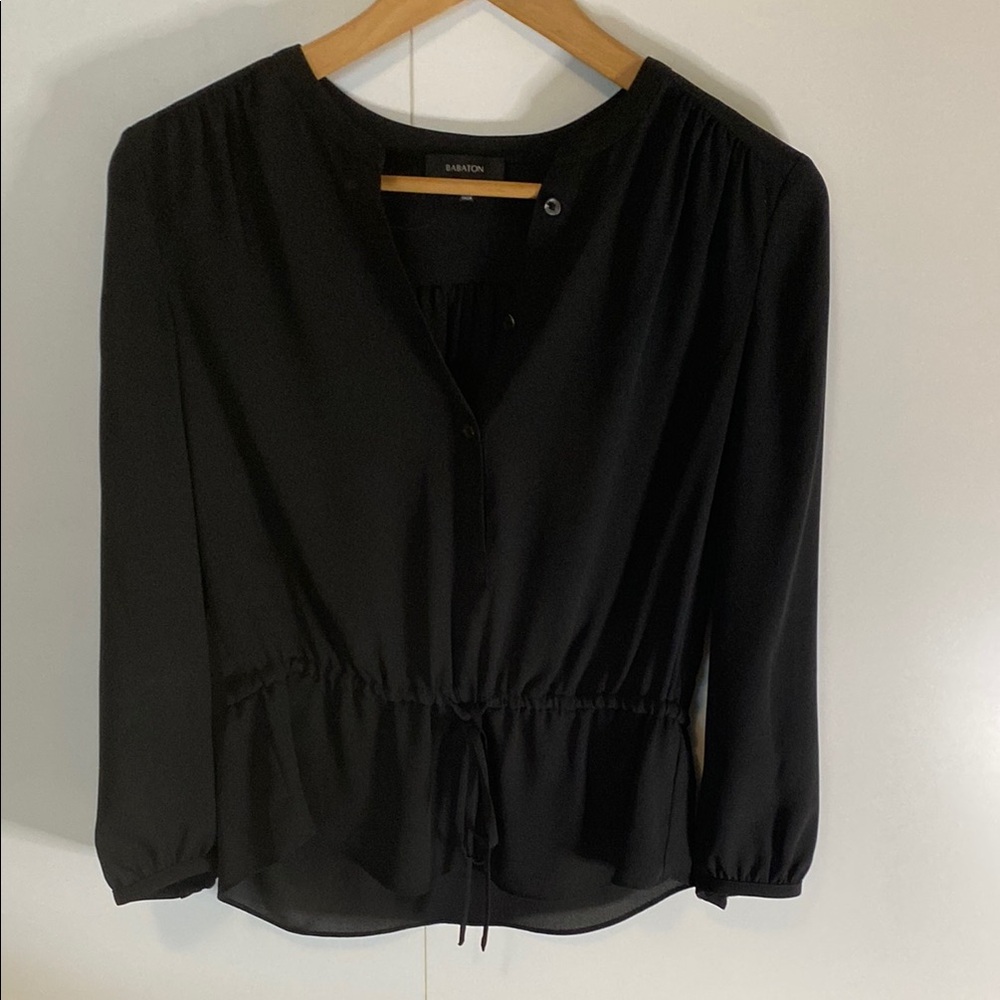 Babaton Black Semi-Sheer Blouse With a Tie Waist.